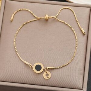 Elegant Gold Bracelet with Black Accents